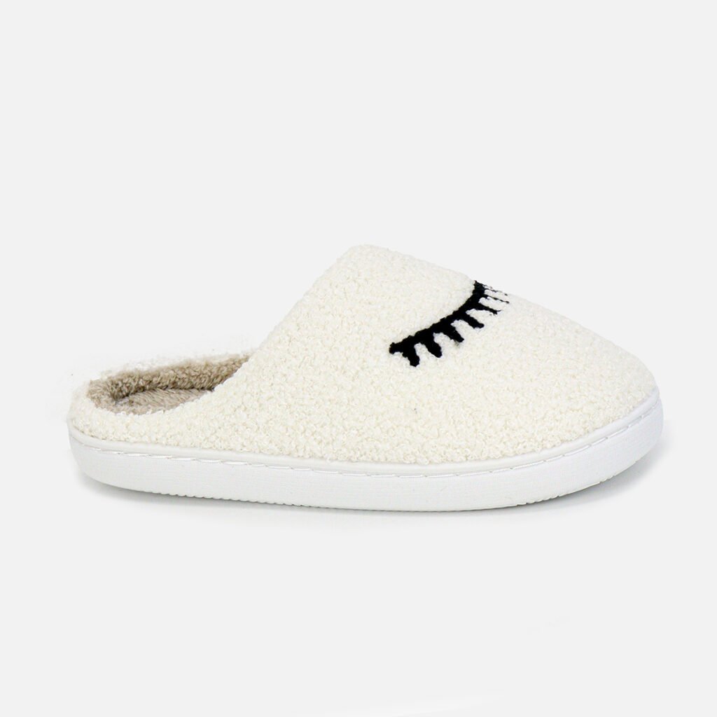 white fuzzy home slippers—eyelash embroidery detail, personalized fit, perfect for cozy lounging.
