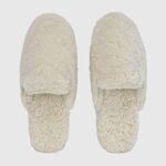 Soft sheepskin fur slip-on slippers with custom sizing and embroidery options, ideal for personalized gifts.