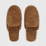Tan shearling mule slippers – open-back fluffy slip-on home shoes, ultra-soft fuzzy indoor footwear for comfort and warmth.