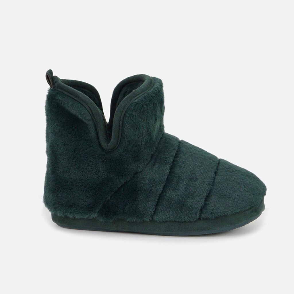 Warm plush indoor ankle boots in deep green, thick fuzzy lining, and non-slip sole for lounging.