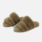 A customizable made of premium sheepskin, offering optional custom logo accents on the two straps.