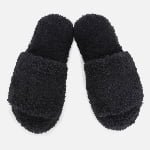 made with warm faux shearling fur, each printed with a custom brand logo.