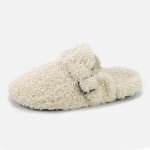 Custom-made cream fuzzy slippers: soft sheepskin upper, adjustable buckle, tailored sizing for warm lounging.
